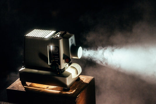 Film projector in a dark cinema — using film clips in language teaching